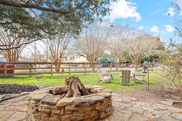 view of patio / terrace featuring a fire pit