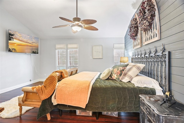 bedroom featuring ceiling fan, lofted ceiling, and dark hardwood / wood-style flooring