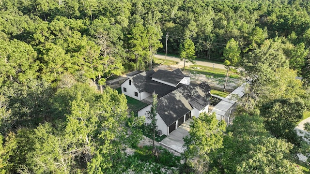 bird's eye view with a forest view