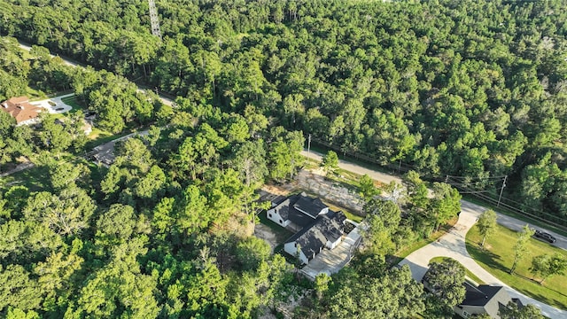 aerial view featuring a view of trees