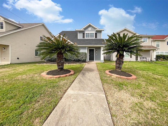 view of front of property featuring a front yard