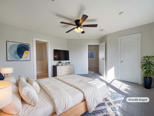 carpeted bedroom featuring ceiling fan