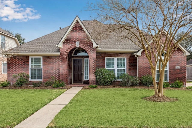 view of front of home with a front yard