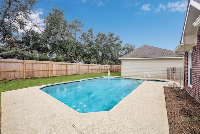 view of swimming pool featuring a patio area