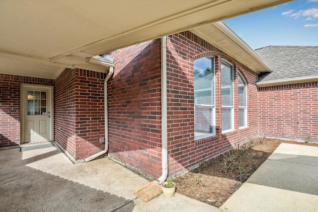 doorway to property with a patio area