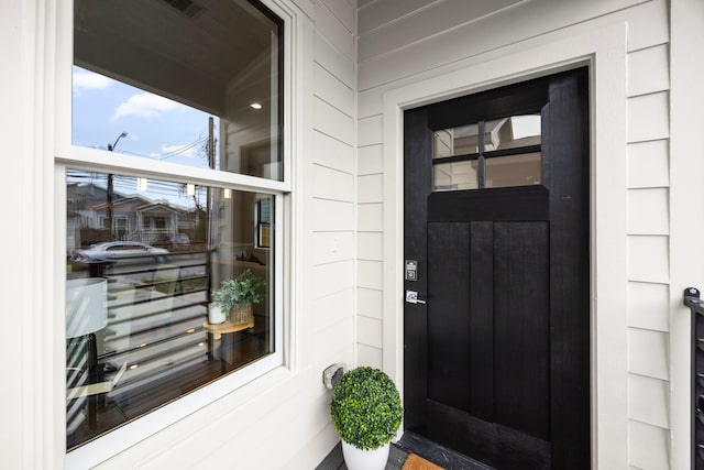 doorway to property featuring visible vents