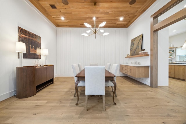 dining space with an inviting chandelier, wooden ceiling, and light hardwood / wood-style floors