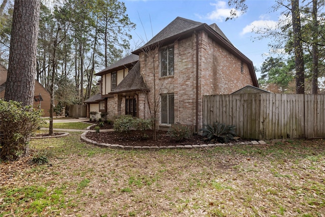 view of home's exterior featuring a yard