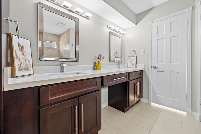 bathroom with vanity and tile patterned floors