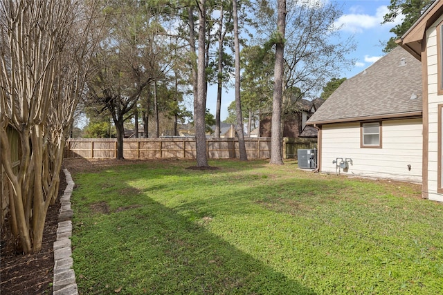 view of yard featuring central AC