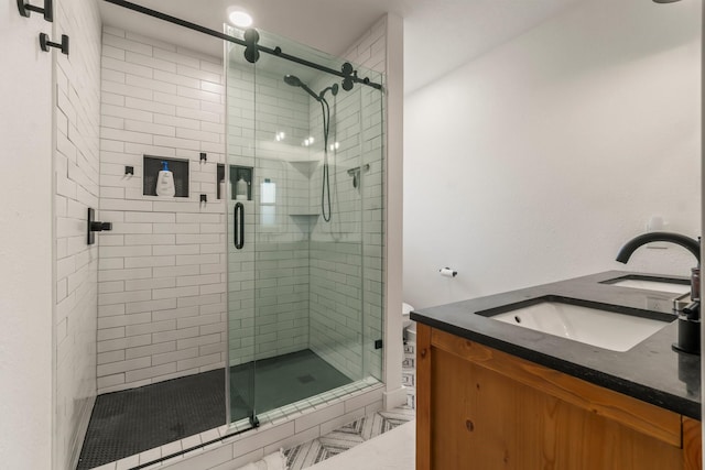 bathroom featuring vanity and walk in shower