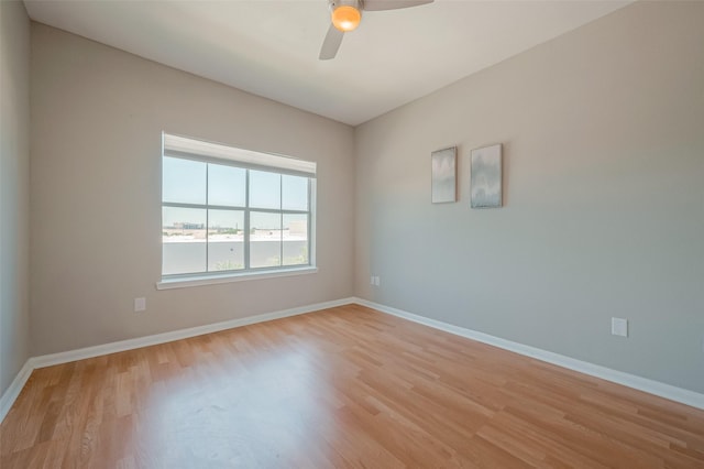 unfurnished room with light hardwood / wood-style floors and ceiling fan