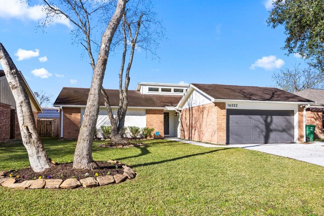 ranch-style house with a garage and a front yard