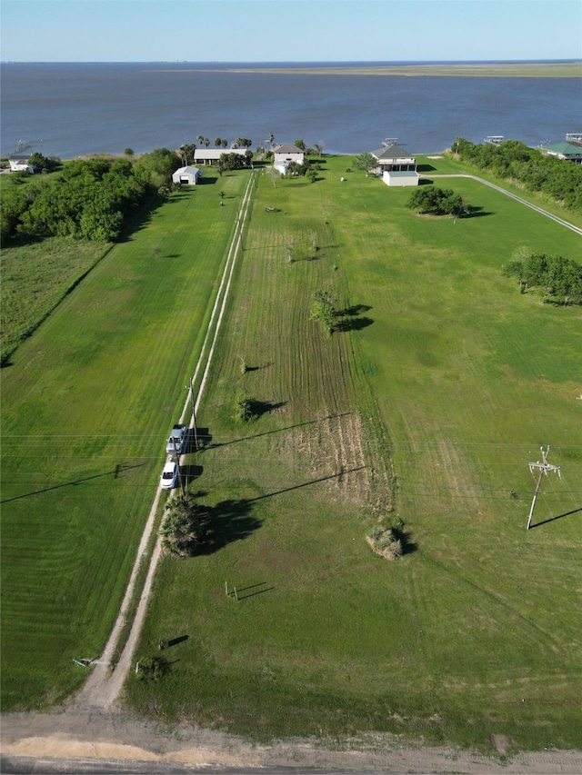 bird's eye view featuring a rural view and a water view