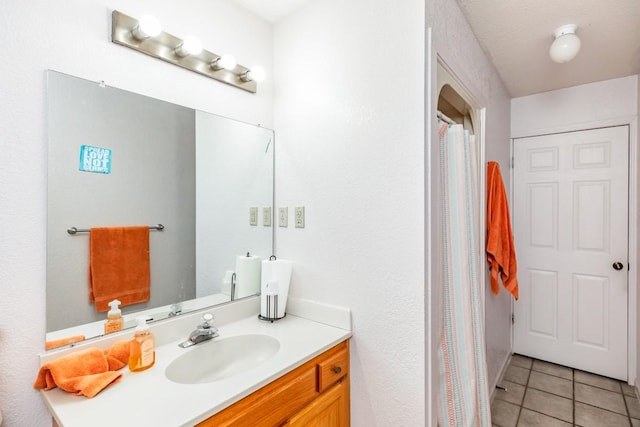 bathroom featuring vanity and tile patterned floors