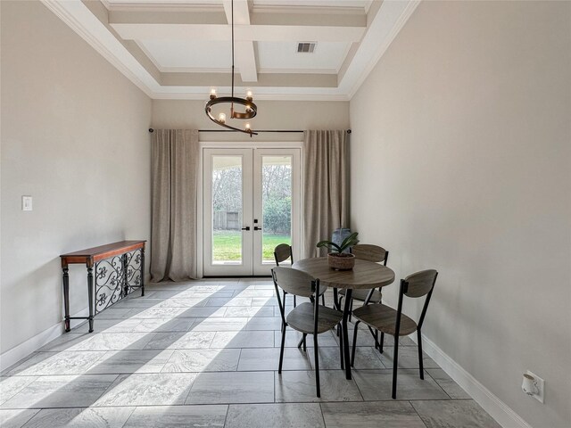 dining room featuring beam ceiling, coffered ceiling, a notable chandelier, ornamental molding, and french doors