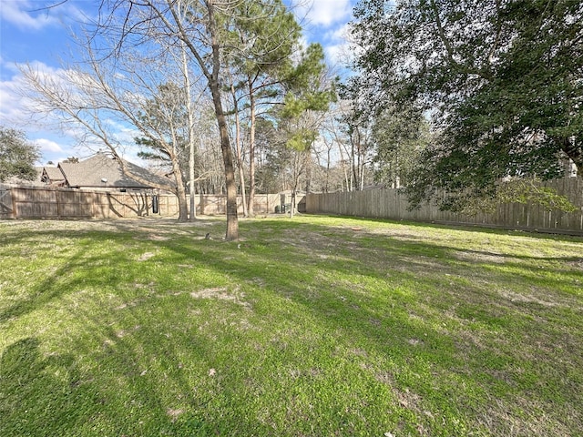 view of yard with fence