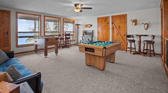 recreation room with baseboards, pool table, a healthy amount of sunlight, and light colored carpet