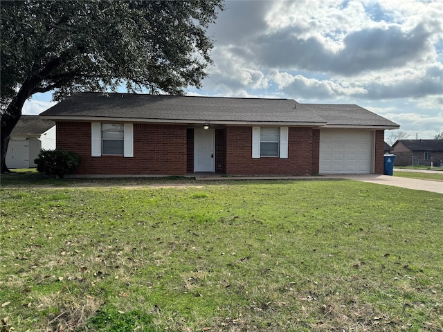 single story home with a garage and a front lawn