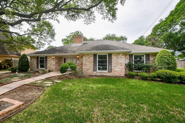 ranch-style home with a front lawn