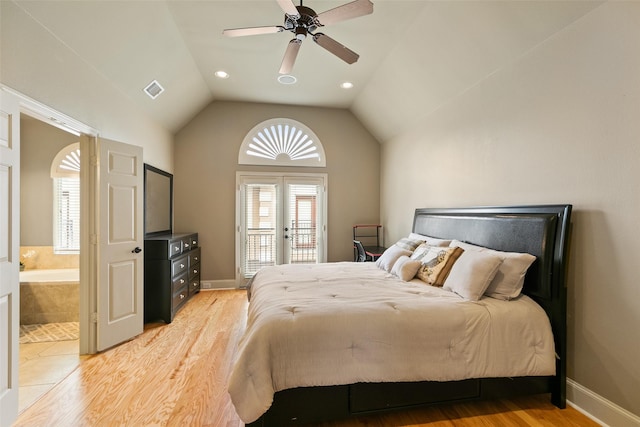 bedroom with vaulted ceiling, access to outside, ceiling fan, light wood-type flooring, and french doors