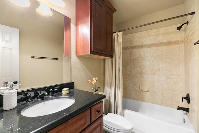 full bathroom featuring vanity, shower / bath combination with curtain, and toilet