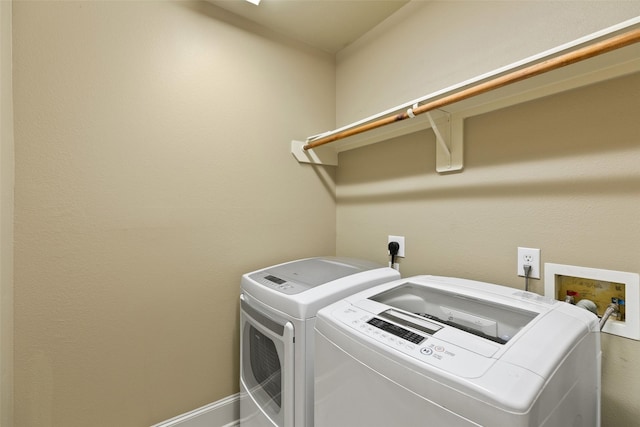 laundry area featuring washing machine and dryer