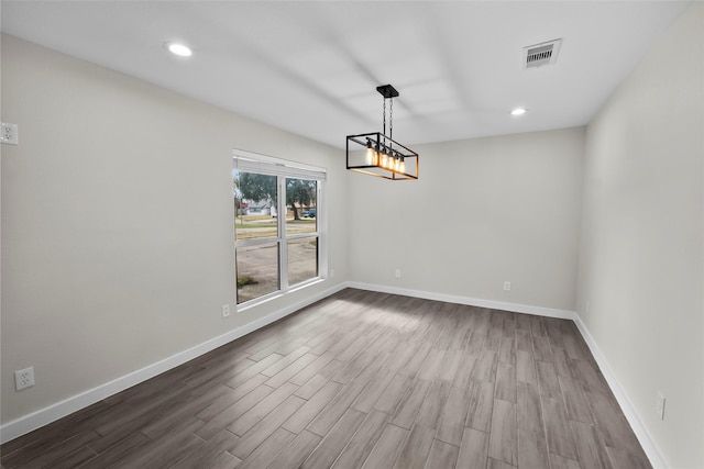 unfurnished dining area with hardwood / wood-style floors