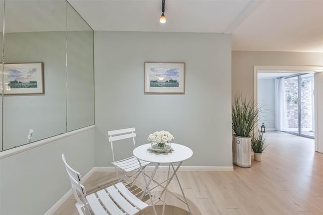 dining space with light wood-type flooring