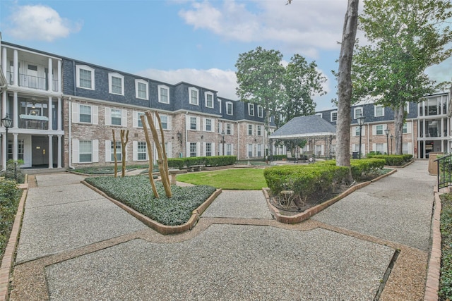 view of property's community featuring a gazebo and a yard