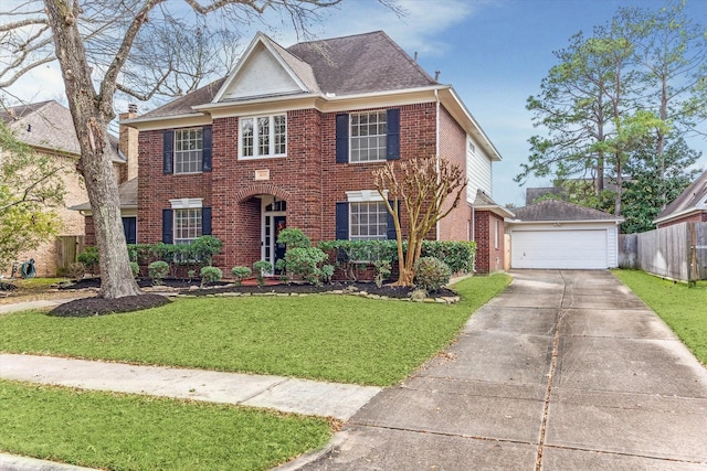 view of front of home featuring a garage and a front yard