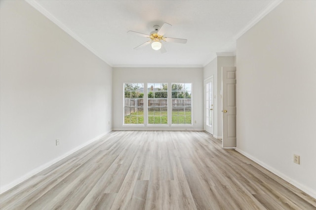 spare room with light hardwood / wood-style flooring, ornamental molding, and ceiling fan