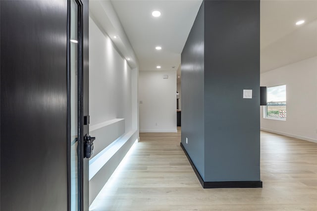 hallway featuring light hardwood / wood-style flooring