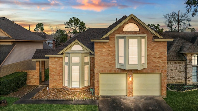 view of front of property featuring a garage