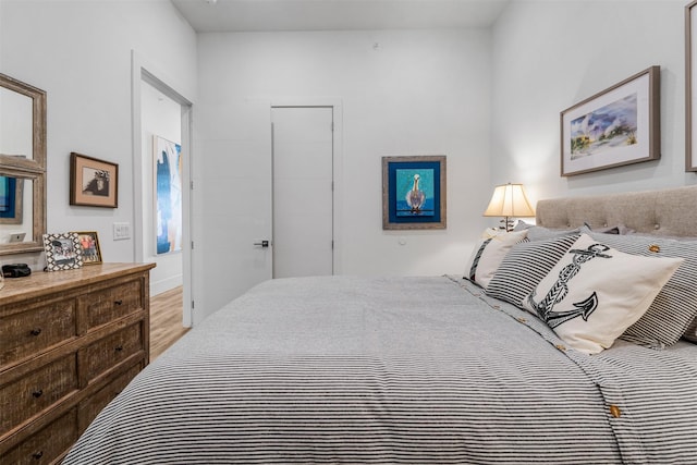 bedroom with light hardwood / wood-style flooring