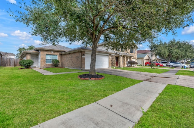 single story home with a garage and a front lawn