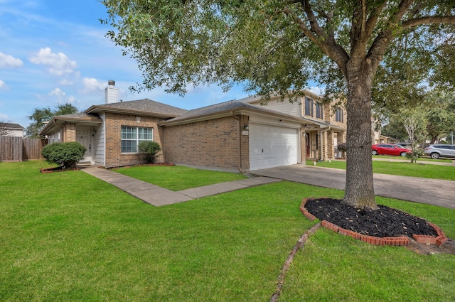 view of front facade with a garage and a front yard