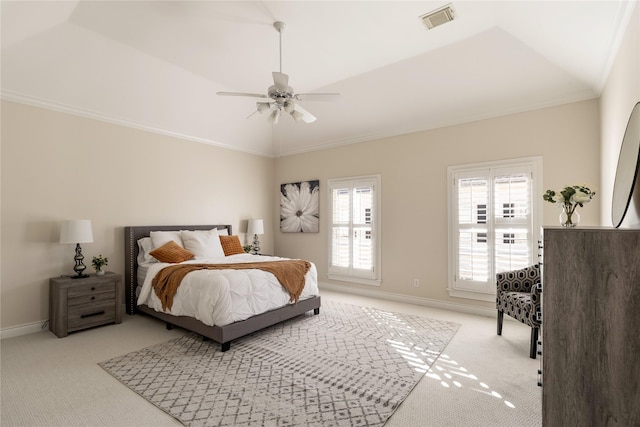 bedroom featuring light carpet, crown molding, lofted ceiling, and ceiling fan