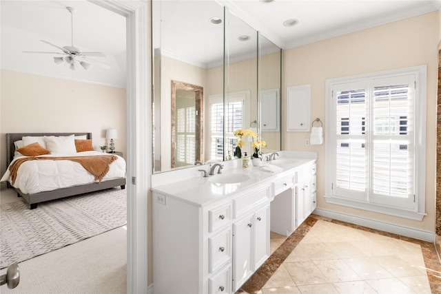 bathroom with ornamental molding, vanity, and ceiling fan