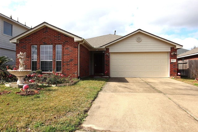 view of front of home featuring a garage and a front yard