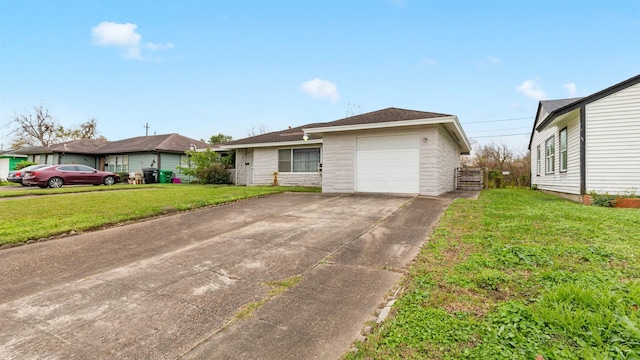 ranch-style home with a garage and a front yard