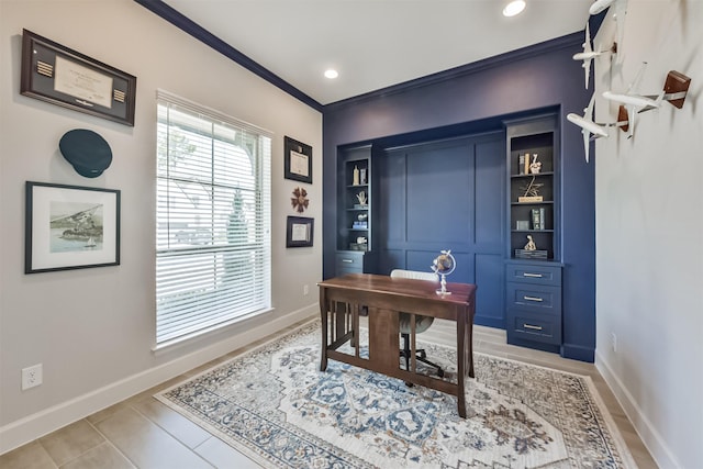 home office with crown molding and built in shelves