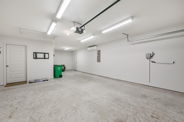 garage featuring a garage door opener, electric panel, and a wall mounted air conditioner