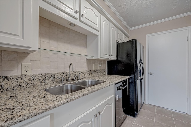 kitchen with white cabinetry, sink, light tile patterned floors, black appliances, and crown molding