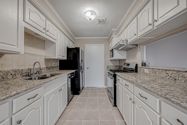 kitchen featuring sink, stainless steel gas stove, white cabinetry, dishwashing machine, and light stone countertops