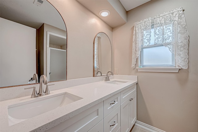 bathroom featuring vanity