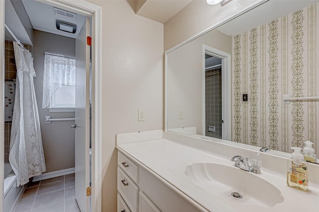 bathroom featuring vanity, tile patterned flooring, and shower / bath combo with shower curtain