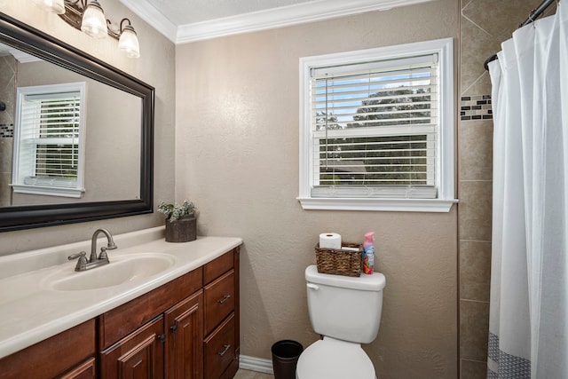 bathroom featuring crown molding, toilet, vanity, and a shower with curtain