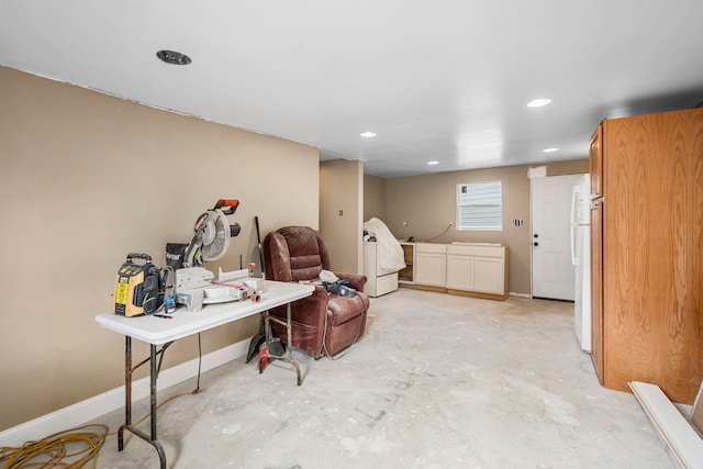 interior space with washer / clothes dryer