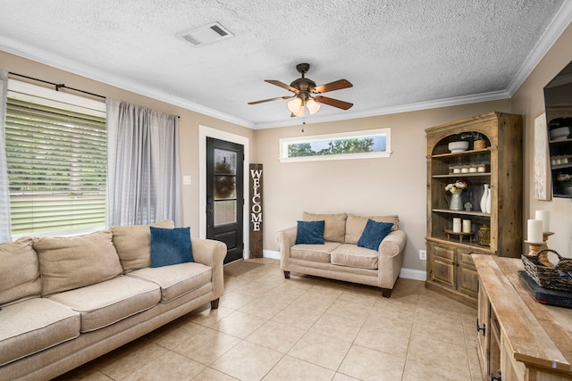 tiled living room with ornamental molding, a textured ceiling, and ceiling fan